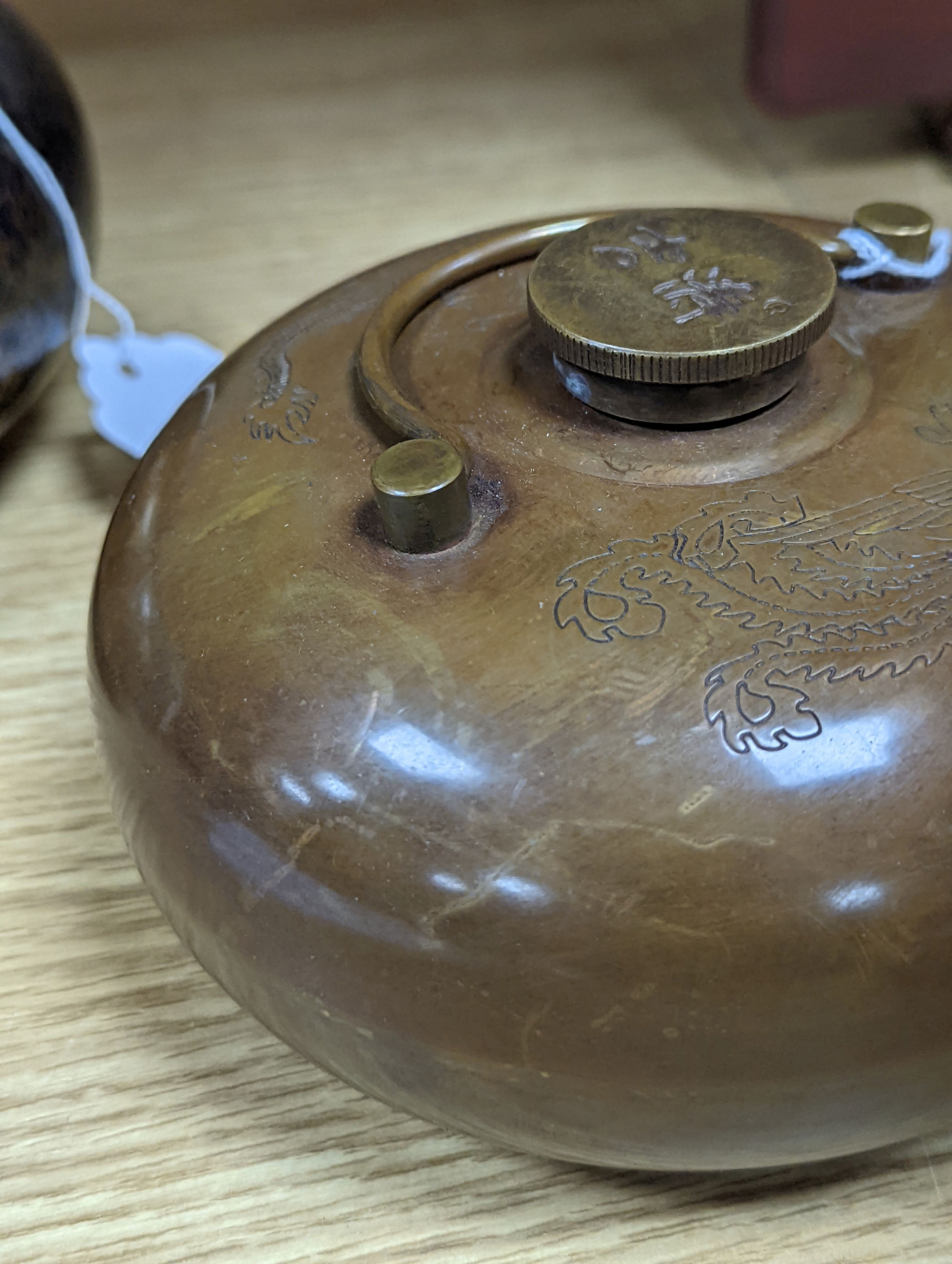 Two Chinese bronze handwarmers and a turquoise glazed jar